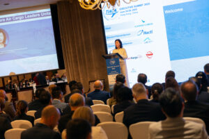 Speaker addressing audience at air cargo conference
