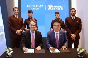 Etihad Cargo and SF Airlines executives signing agreement